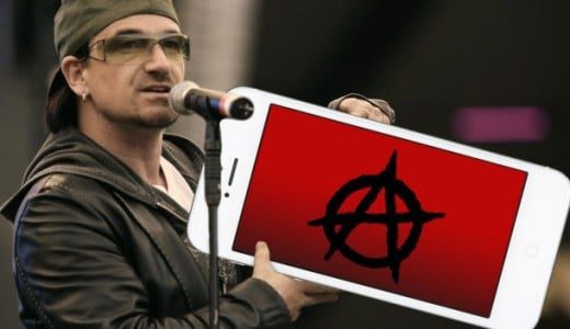 U2 Bono holding Iphone