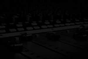 A black and white photo of a sound board